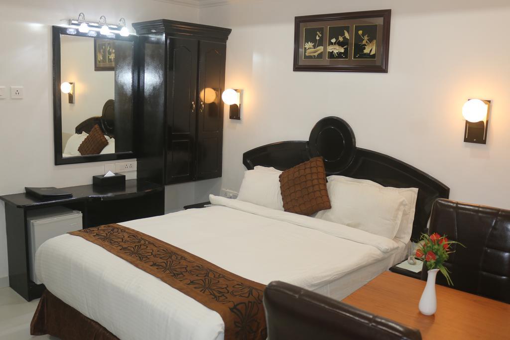Gago Inn Thiruvananthapuram Chambre photo